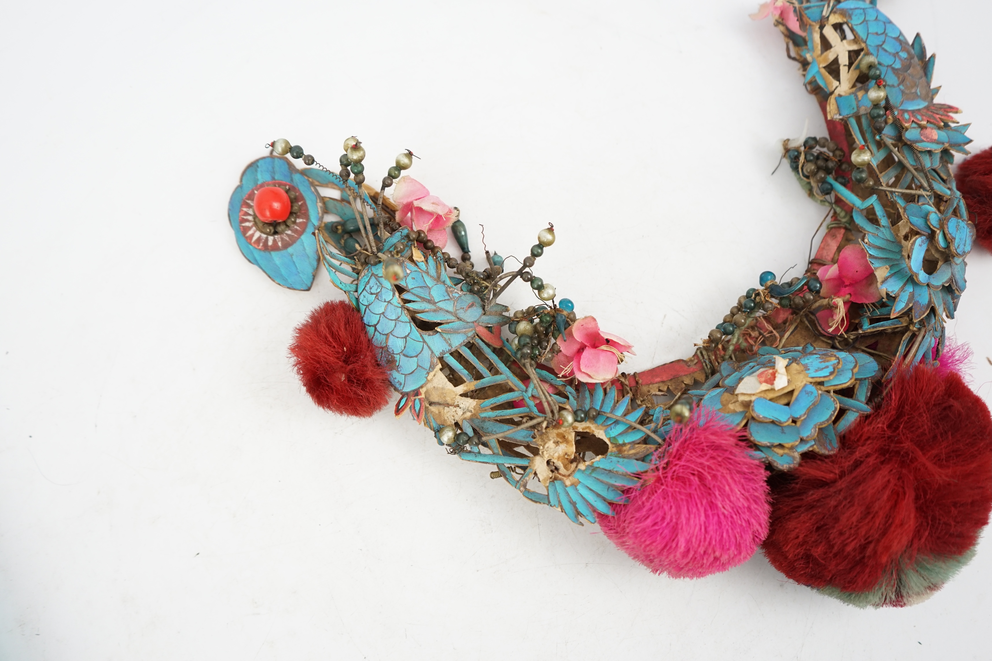 A Chinese kingfisher feather and glass bead mounted headdress, late Qing dynasty